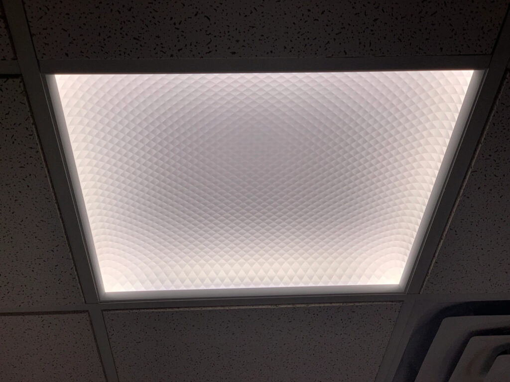 A two by two foot square recessed ceiling light