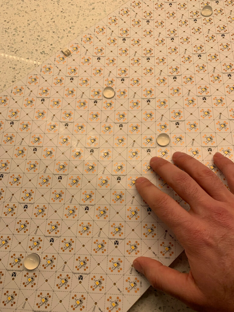 A sheet of small lights (similar to tape lights) spaced about an inch apart
